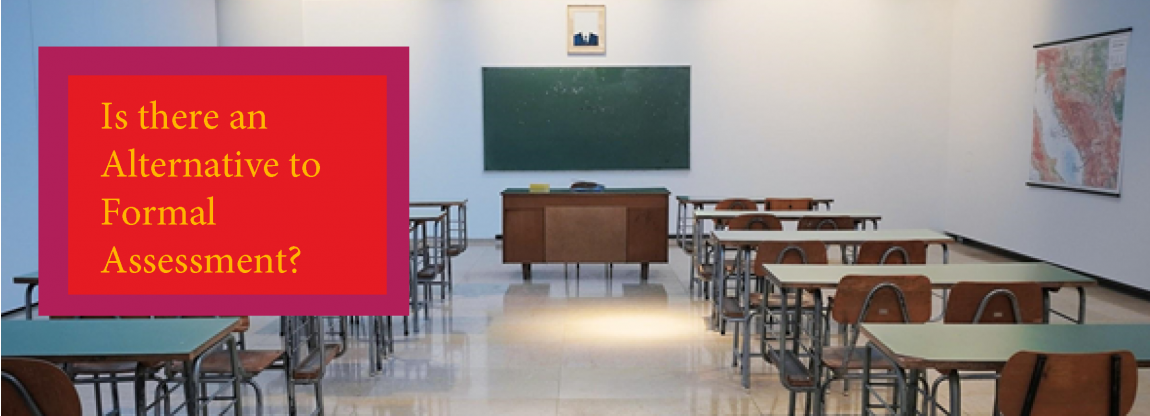 Empty classroom with desks and blackboard