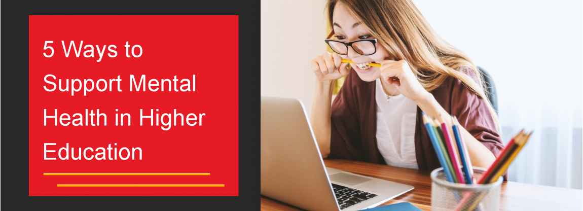 Frustrated woman staring at computer screen biting pen