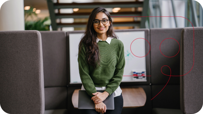 Female student clutching laptop with a decorative quote brand element. Female student clutching laptop with a decorative quote brand element.